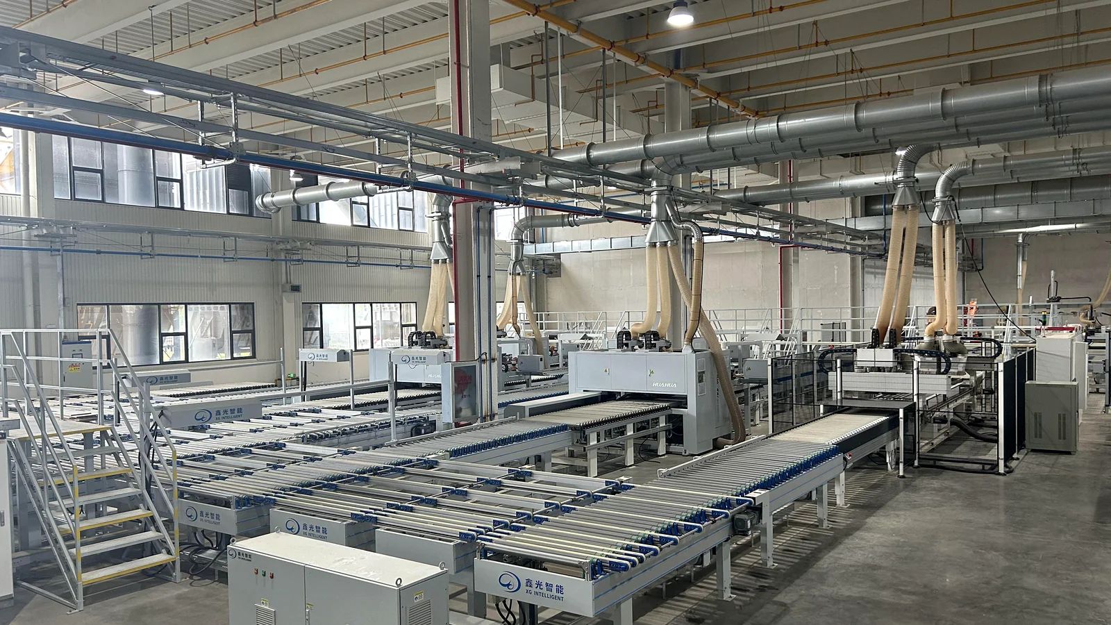 Wide view of the automated cabinetry panel processing workshop