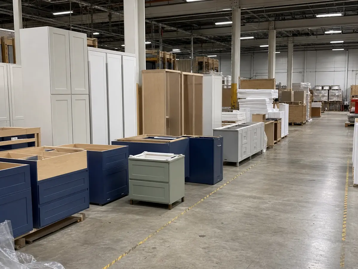 Mixed-finish cabinet modules staged for packing
