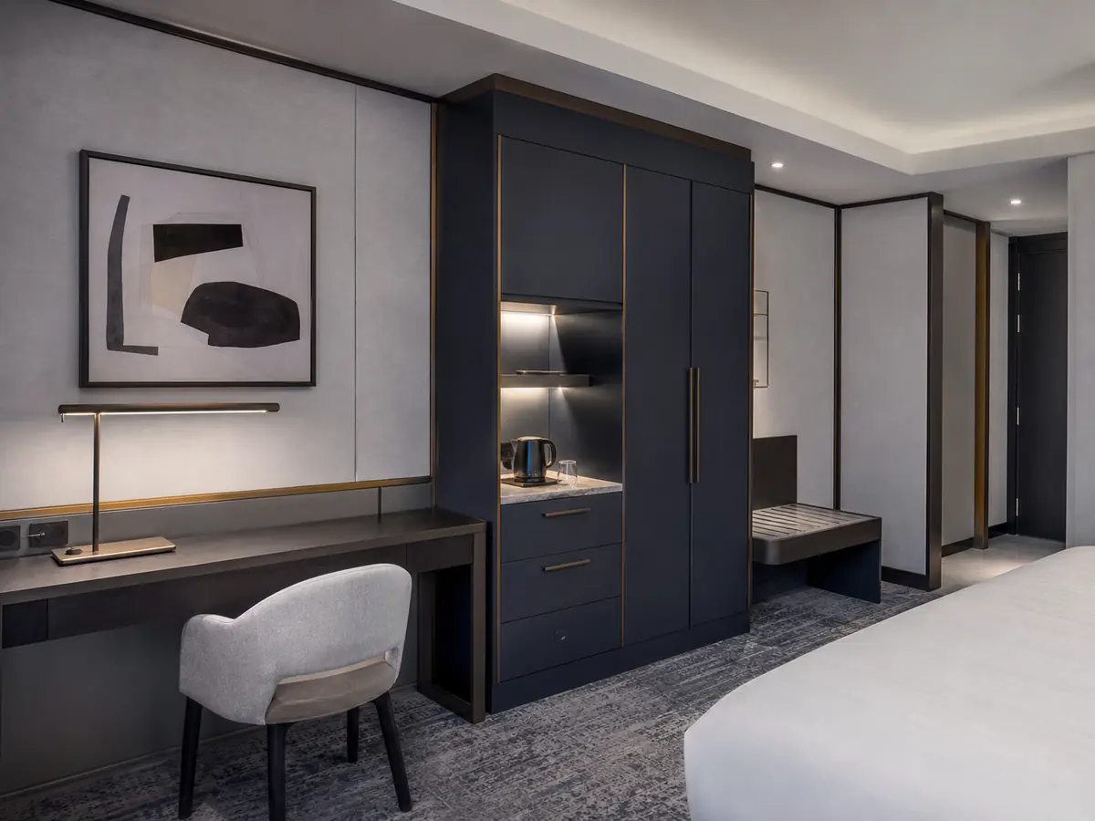 Contemporary blue-gray hotel guestroom casework