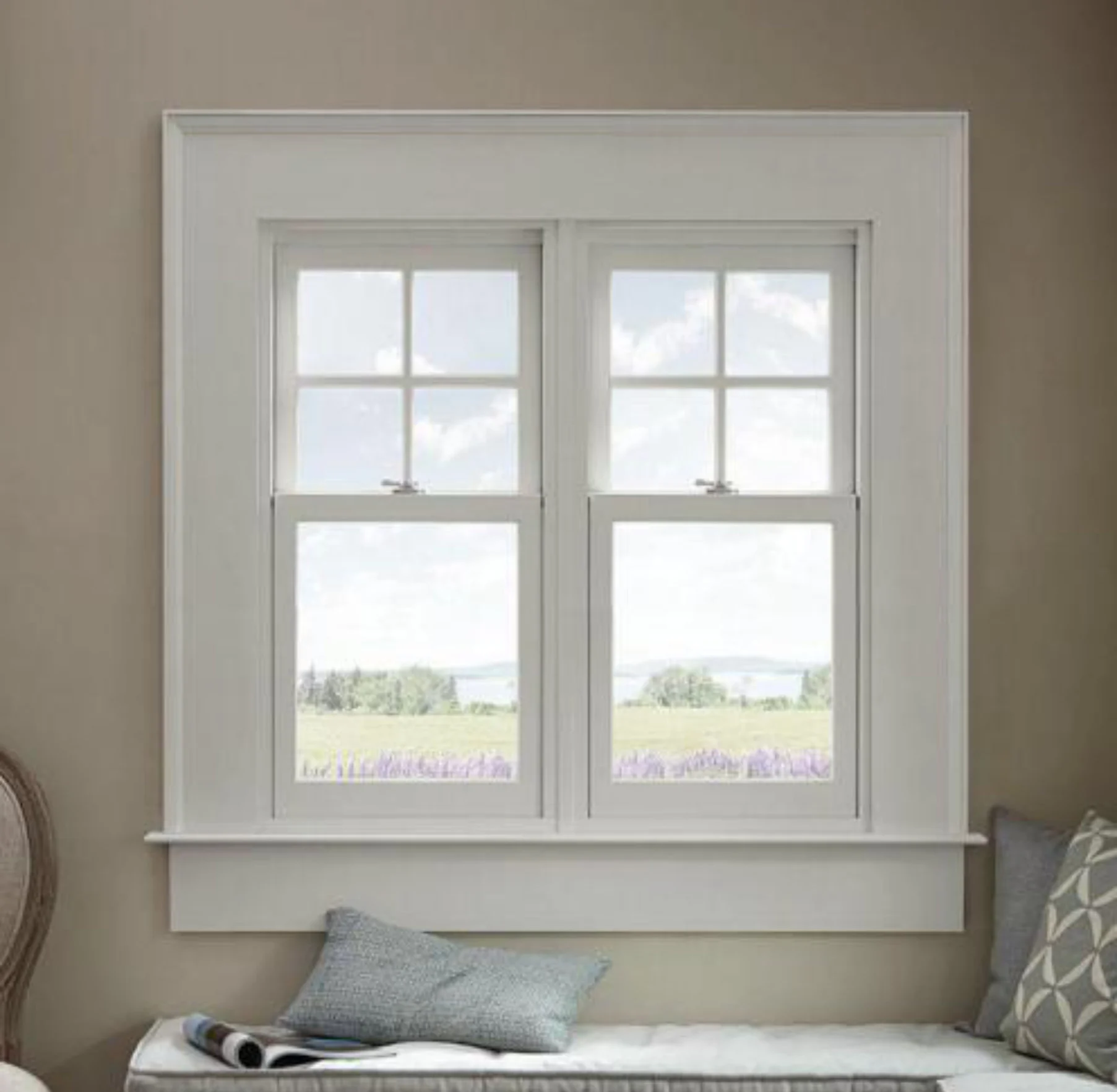 White aluminum casement windows installed in a residential wall