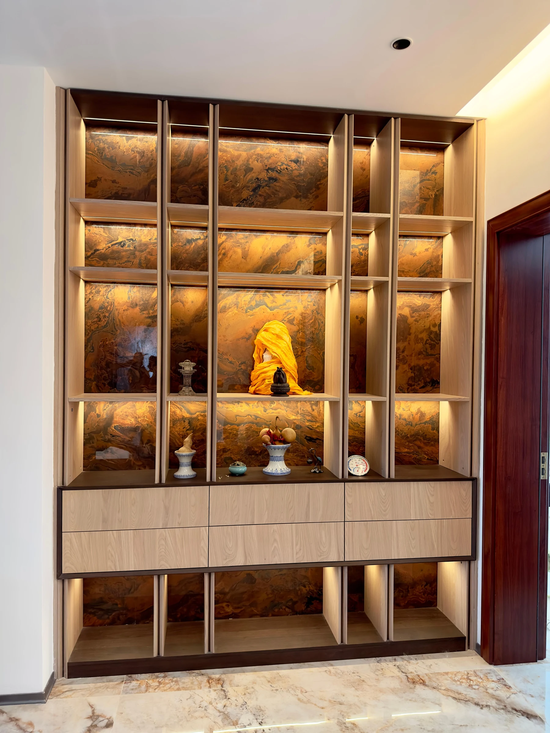 Installed custom display joinery with integrated lighting