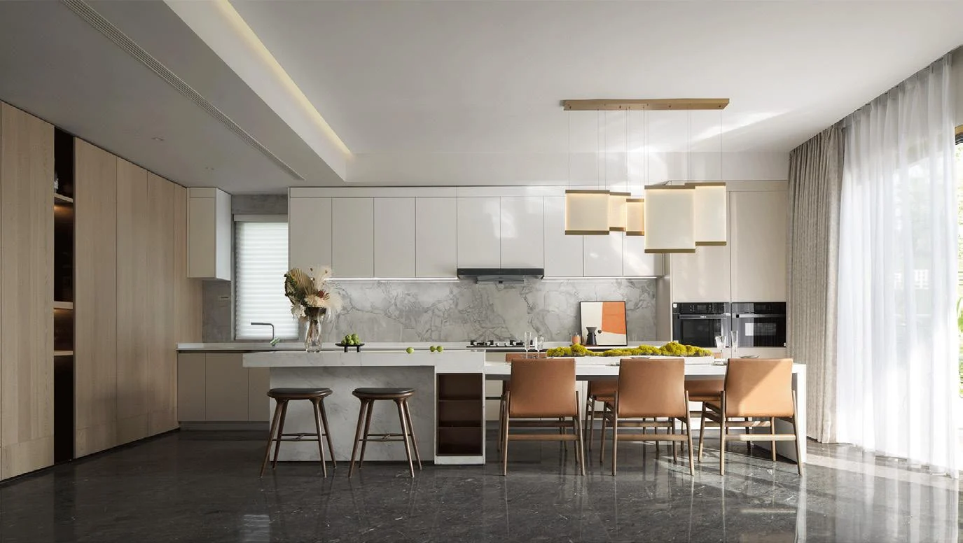 Contemporary kitchen cabinetry with island and dining area