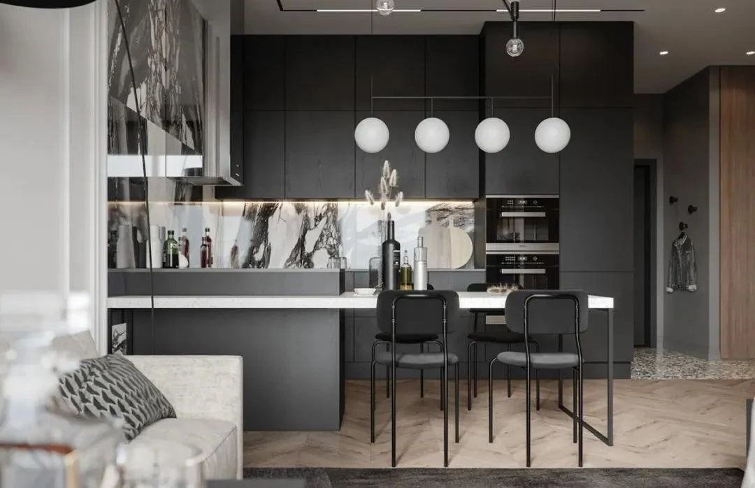 Black and white handleless kitchen with island seating