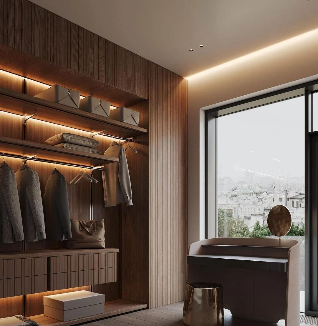 Fitted wardrobe beside a window and dressing desk