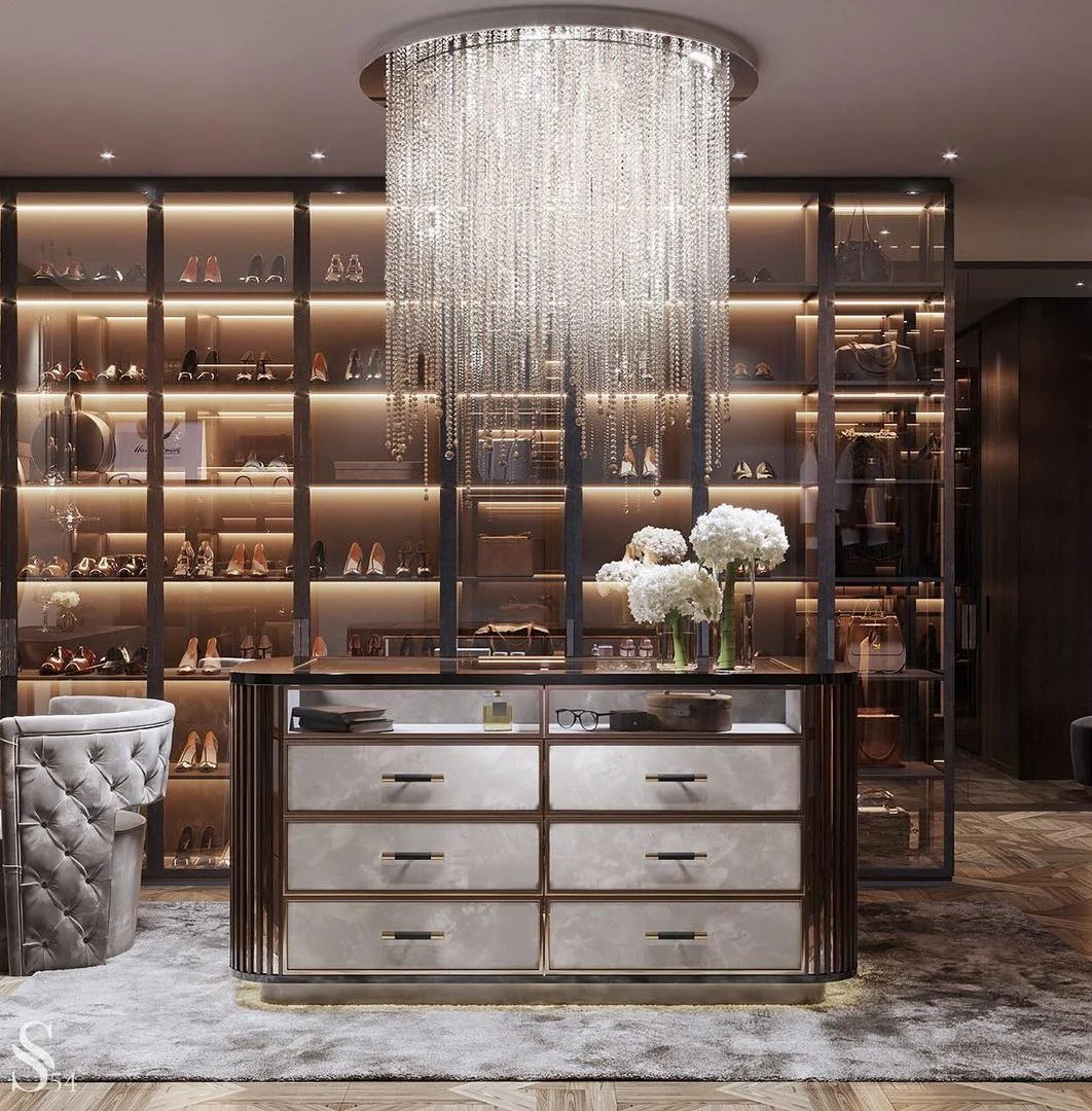 Boutique style walk-in wardrobe with glass fronts