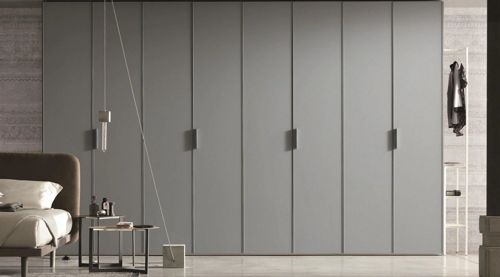 Custom walk-in closet with illuminated storage and central island