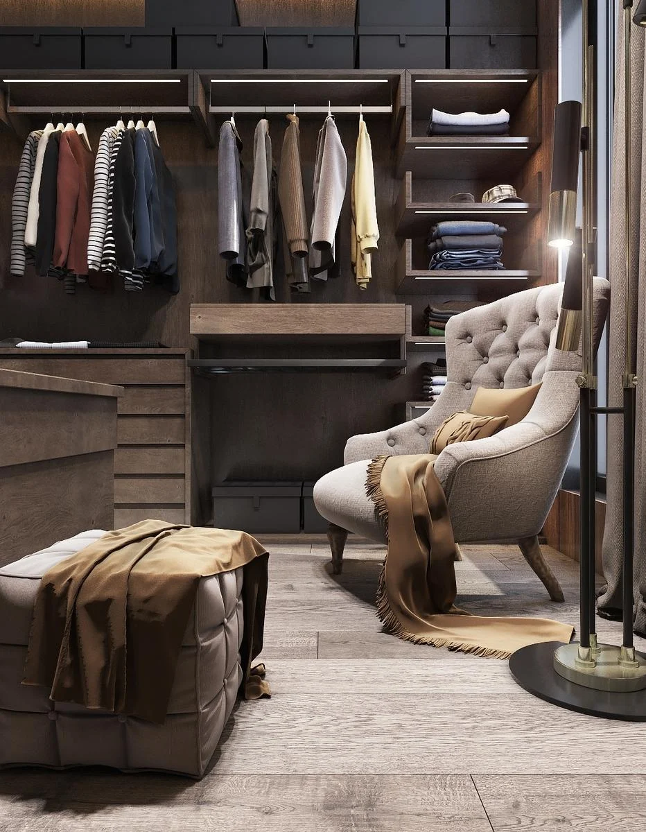 Walk-in closet showing open hanging, drawers and illuminated shelves