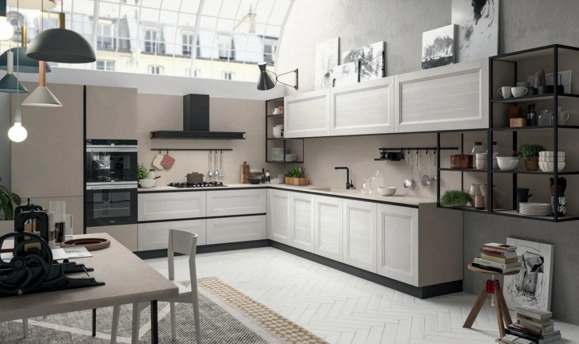 White Shaker kitchen with dark upper cabinets and appliances